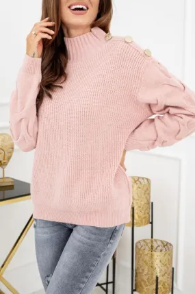 Maglione rosa con bottoni oro e maniche ad intreccio